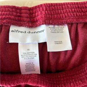 Alfred Dunner velour pants. Color: Merlot